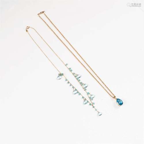 A fourteen karat gold and aquamarine necklace,