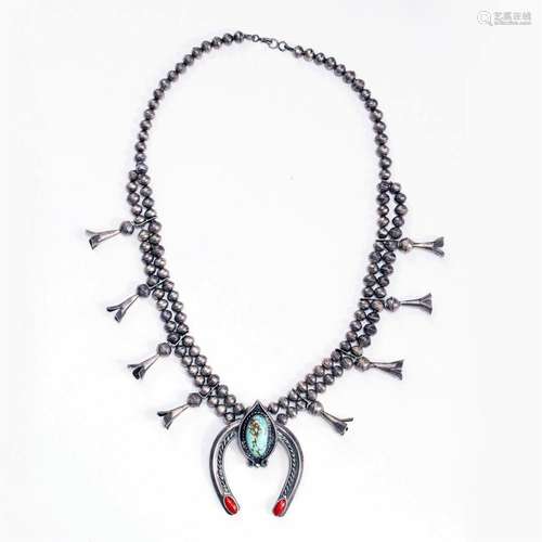 A Navajo squash blossom necklace,