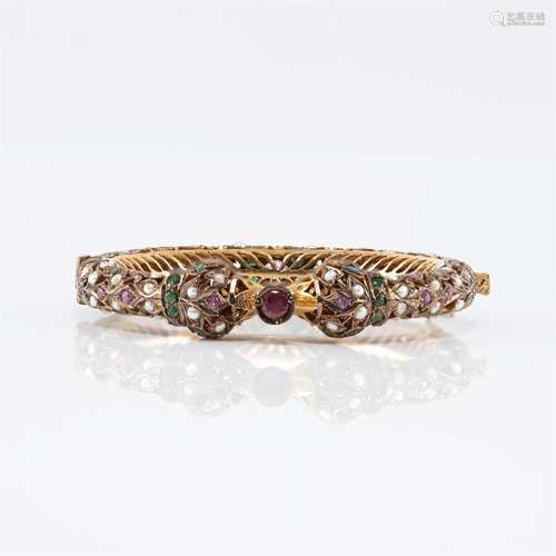 An Indian ten karat gold gem-set bracelet