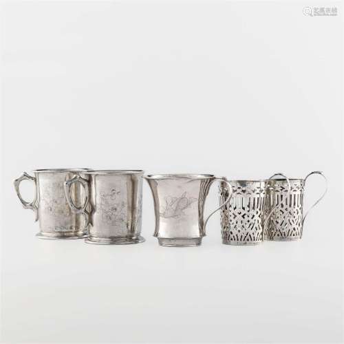 A collection of five Chinese export silver mugs and cup hold...