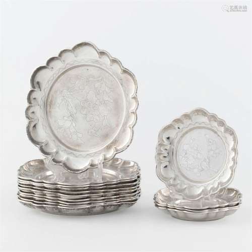 A collection of fourteen Chinese export silver dishes,
