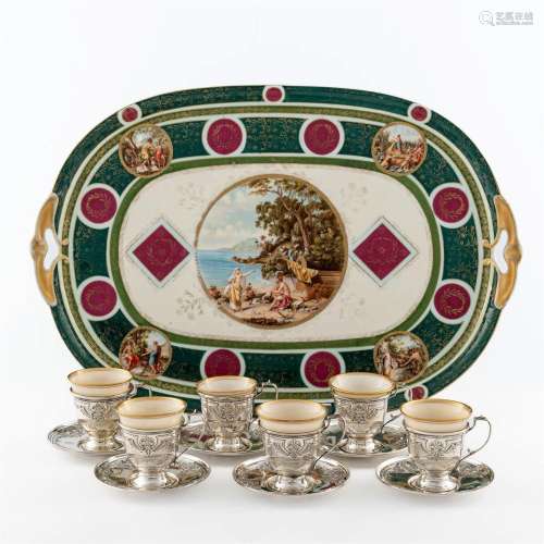 A sterling silver and hand-painted porcelain demitasse servi...