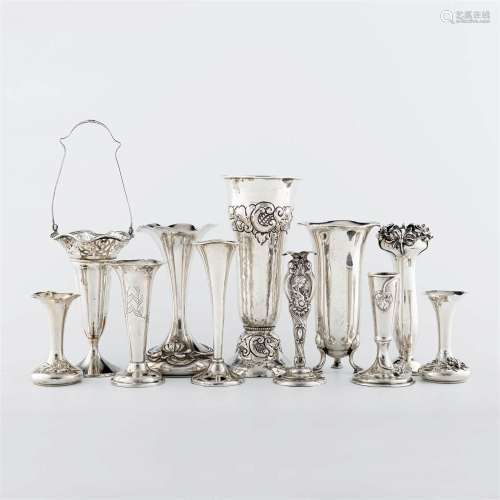 A collection of eleven Art Nouveau sterling silver bud vases...