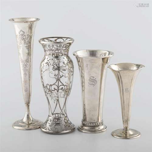 A collection of three American sterling silver vases and a s...