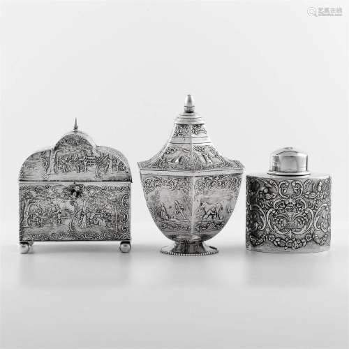 A collection of three silver tea caddies