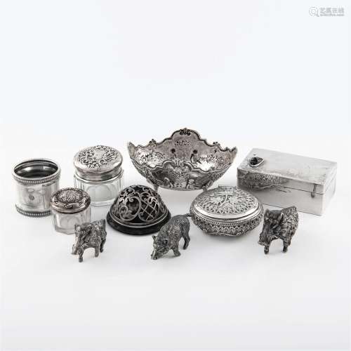 A collection of silver objects and figures