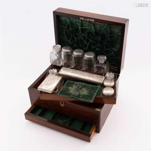 A wooden traveling toiletry box