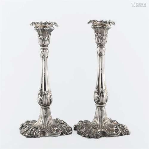 A pair of Continental Rococo style silver-plated candlestick...