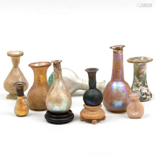 Nine Roman Glass Vessels with Two Stands