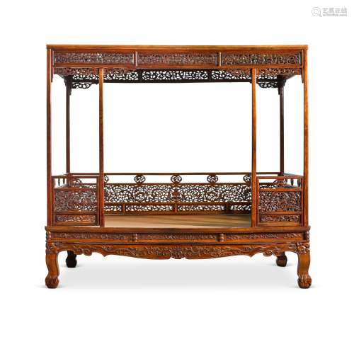 An exceptional and rare Huanghuali six-post canopy bed (Jiaz...