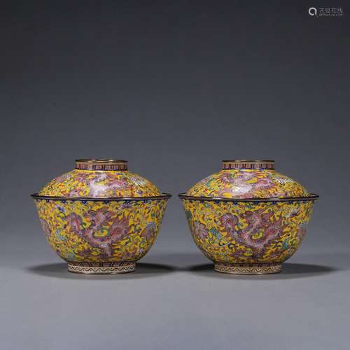 A pair of phoenix bird patterned copper enamel covered bowls