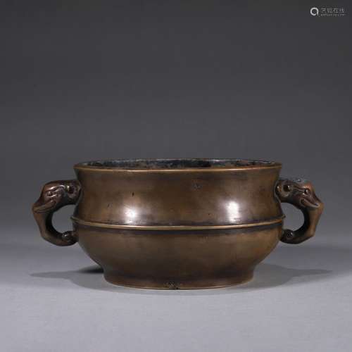 A copper censer with elephant shaped ears