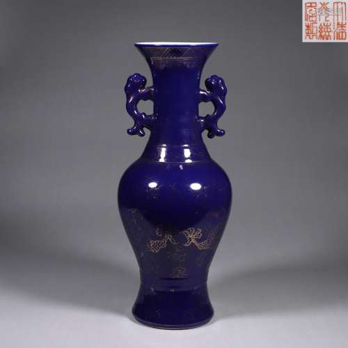 A gilt deep blue glaze porcelain double-eared vase
