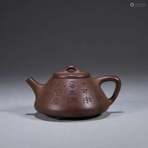 An inscribed Yixing clay teapot