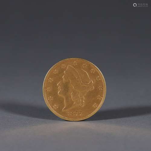 A figure patterned gold coin