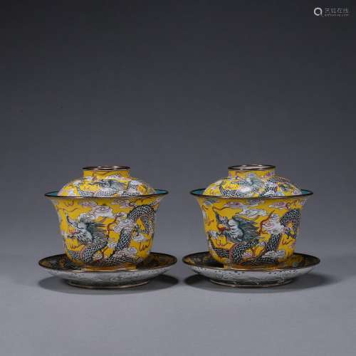 A pair of dragon patterned copper enamel covered bowls