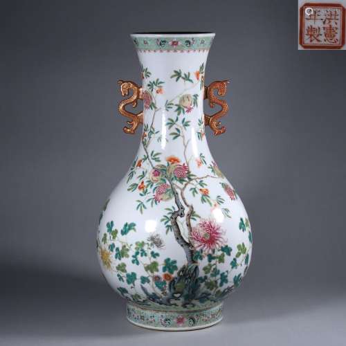 A famille rose pomegranate and flower porcelain double-eared...