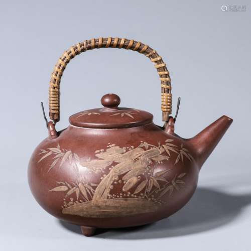 A painted loop-handled Yixing clay teapot