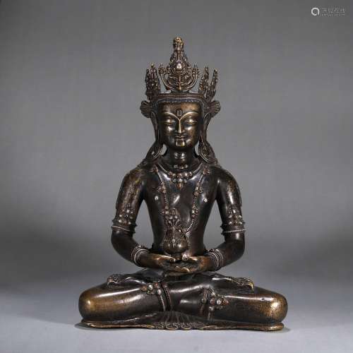 A silver-inlaid copper Amitabha statue
