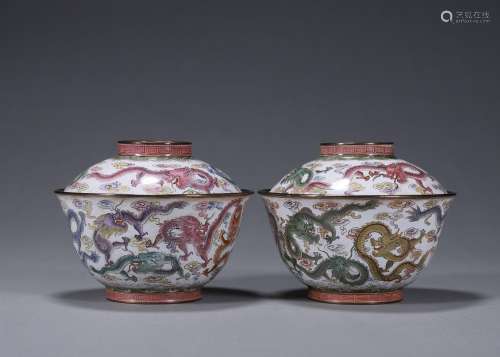 A pair of dragon patterned copper enamel covered bowls