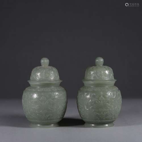 A pair of flower patterned jade vases