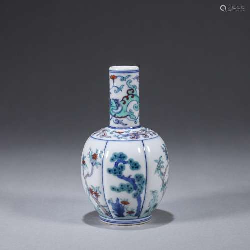 A doucai pine and plum blossom porcelain vase