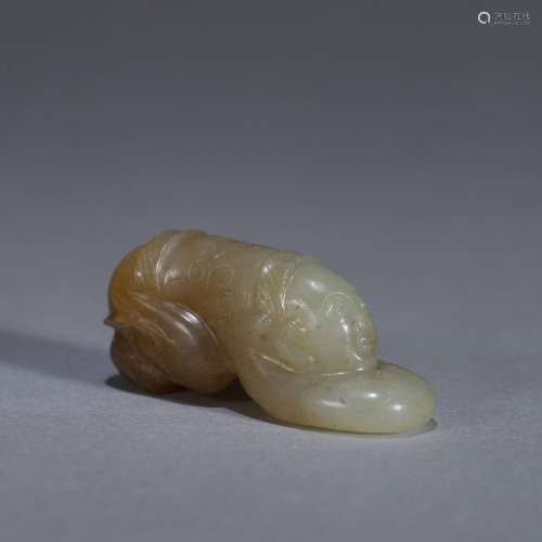 A jade kneeling figure ornament