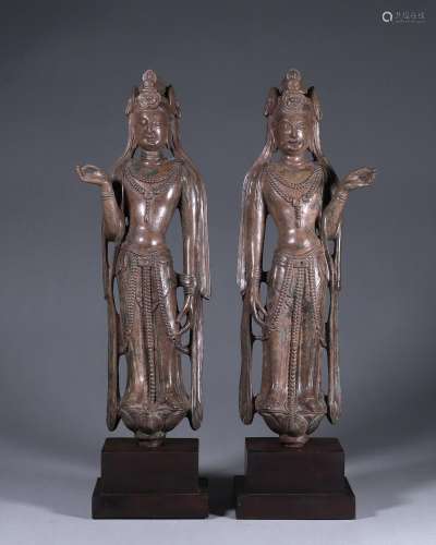A pair of silver Guanyin statues