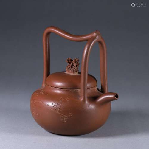 A loop-handled Yixing clay teapot