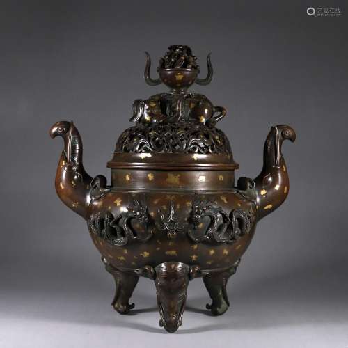 A three-legged gold spotted copper censer with elephant shap...