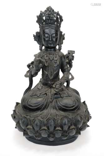 A Chinese bronze of a Guanyin