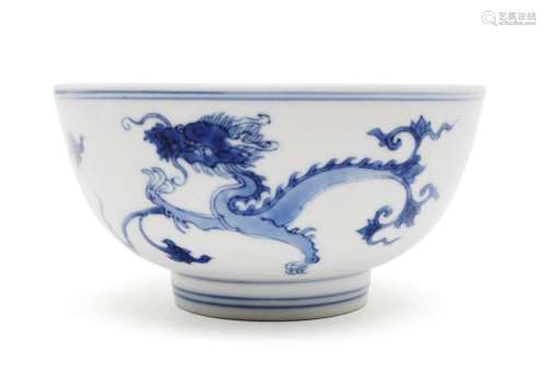 A small blue and white dragon and lotus bowl
