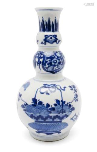 A large triple-gourd blue and white vase