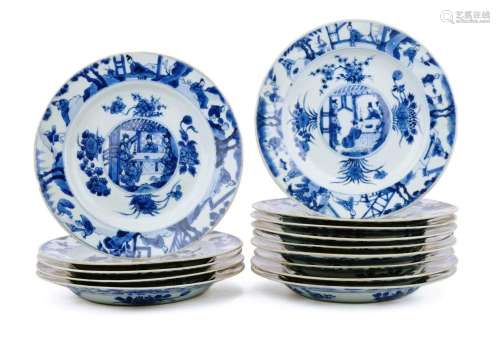 Fourteen blue and white plates