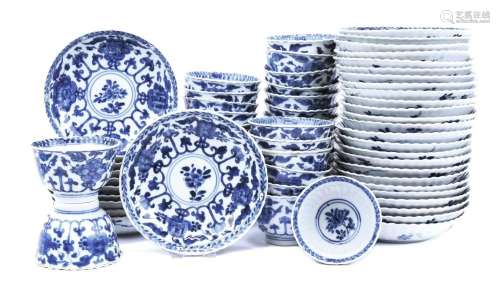 A group of thirty-six blue and white cups and saucers
