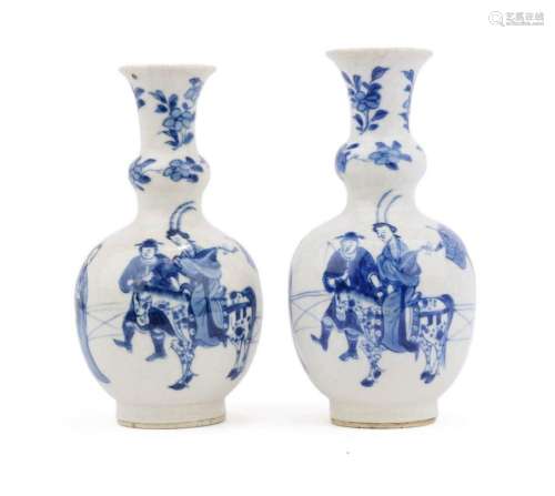 Two small soft past blue and white vases
