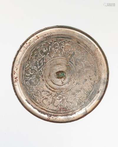 A silvered bronze circular mirror Qin to early Western Han d...
