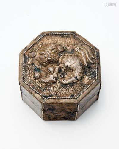 A silver 'lion' octagonal box and cover Possibly Tan...