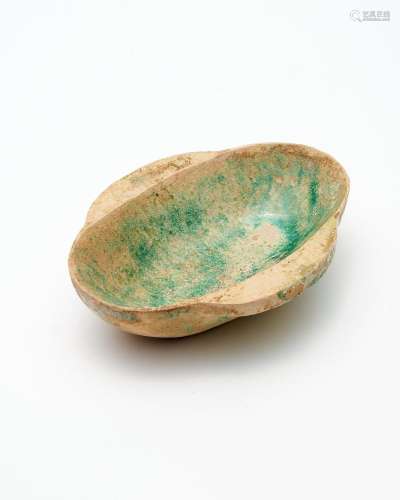 A green-glazed 'ear' cup Han dynasty
