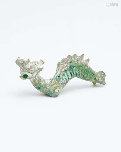A green glass figure of a dragon Possibly Warring States