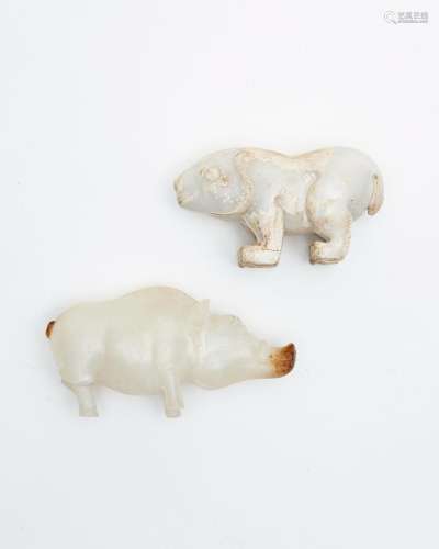 Two white jade carvings of a bear and a boar 19th/ 20th cent...