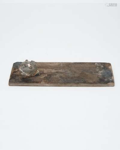 A stone slab with a grinder for eyebrow makeup Han dynasty (...