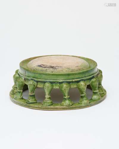 A green-glazed 'biyong' inkstone Sui or Tang dynasty