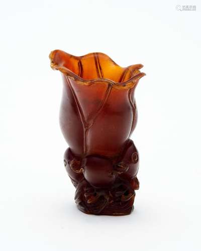 A small carved horn 'carp and lotus leave' libation ...