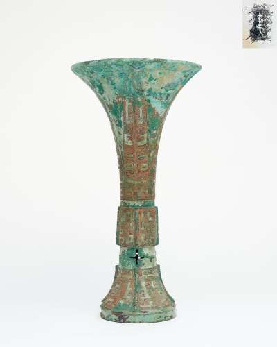 An archaic bronze wine vessel, Gu Late Shang dynasty (c. 160...