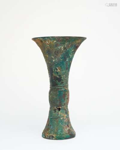 An archaic bronze wine vessel, Gu Late Shang dynasty (c. 160...