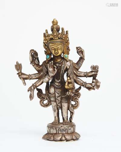 A parcel-gilt silver alloy and gilt figure of Avalokiteshvar...