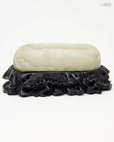 A pale celadon jade washer 19th/ 20th century