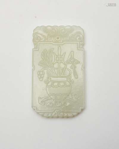 A white jade 'flowers and antiquities' plaque Qing d...