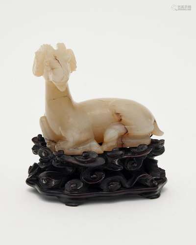 A pale celadon jade reclining ram Qing dynasty to Republic p...